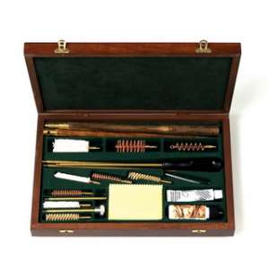 Complete wood case kit composed by 3 cleaning sets: for shotgun,¶for rifle, for pistol.